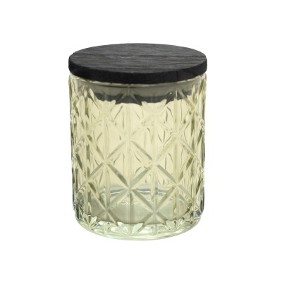 green glass candle holder with wooden lid